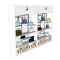 Display Shelves Featuring Various Colored Handbags On Multiple Tiers With Decorative Base