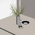 Green Branches In White Vase On White Table Near Window Blinds With Small Plate