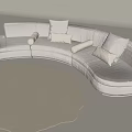 Light Gray Irregular Shaped Sofa With Curved Design And Circular Rug In Living Room