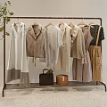 Minimalist Clothes Display On Rack With Neutral Tones Various Styles Plant And Bags