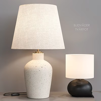 Stylish Table Lamps Featuring White Speckled Ceramic And Black Bases With Fabric Shades 3d model