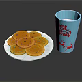 Delicious Round Orange Biscuits On White Plate With Blue Christmas Cup And Reindeer Design