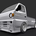 Silver Small Pickup Truck With Open Cargo Bed And Sporty Wheels Design