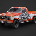Vintage Orange and White Truck With Rustelle Graffiti Design And Large Off-Road Tires