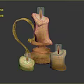 Metallic Decorative Candle Holder With Two Lit Beige Candles And Burning Flames
