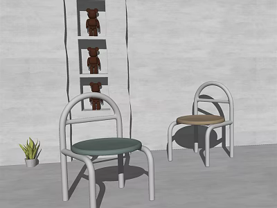 Two Modern Leisure Chairs With White Frames Green Brown Cushions And Small Potted Plant 3d model