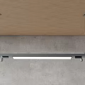 Modern Linear Chandelier Hanging From Wooden Ceiling Against Concrete Wall