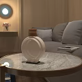 Round White Decorative Lamp On Marble Coffee Table In Minimalist Living Room With Gray Sofa