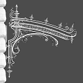 Ornate Iron Awning With Intricate Designs Mounted On Stone Wall Above Windows