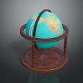 Blue Globe with Yellow Continents on Circular Wooden Rotating Stand Base