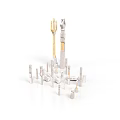 Abstract Architectural Model With Tall Golden And White Structures And Small Pillars