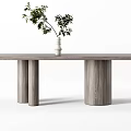 Modern Wooden Dining Table With Cylindrical Legs And White Vase Green Plants