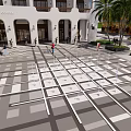 Modern Plaza Landscape Featuring Wave Pattern Pavement Circular Central Area And Palm Trees 3d model