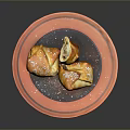 Delicious Golden Pastries on Orange Plate Topped with Powdered Sugar and Dark Background