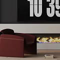 Red Upholstered Accent Chair In Modern Living Room With Fireplace Flames