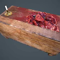 Wooden Chest Displaying Red Substance On Top And Candle By Decorative Drawers