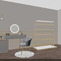 Elegant Clothing Store Interior With Golden Display Rack Grey Chair And Round Mirror