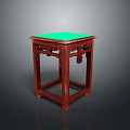 Traditional Carved Wooden Stool with Green Square Top and Decorative Legs