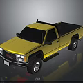 Yellow GMC Pickup Truck With Black Bed Front Grille And Off Road Wheels