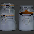Blue Glass Storage Jars With Orange Seals And Metal Clips For Kitchen Use