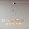 Modern Double Layer Chandelier With Multiple Cylindrical Textured Shades And Silver Frame On Decorative Wall