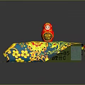 Table with Blue Yellow Floral Tablecloth and Traditional Red Matryoshka Doll