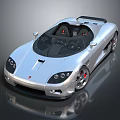 Silver Convertible Sports Car With Sleek Aerodynamic Design And Red Brake Calipers