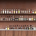 Wine Bottles And Glasses Neatly Arranged On Wooden Shelves With Brown Background