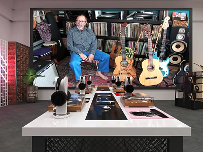 Man Sitting In Room With Guitars Records Speakers Headphones And Audio Gear 3d model