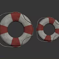 Red And White Striped Lifebuoys With Rope Handles For Marine Safety