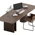 Modern Wooden Desk with Computer Monitor Keyboard Mouse Books Plant and Brown Chair