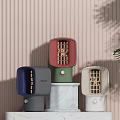 Colorful Modern Small Electric Appliances On Marble Base With Striped Wall And Green Plant