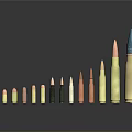Various Types Of Weapon Bullets With Different Sizes And Metallic Colors Arranged