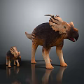 Adult and Juvenile Dinosaur Models in Brown and Beige Standing on Dark Reflective Surface