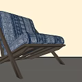 Modern Leisure Chair With Blue White Geometric Pattern And Dark Wooden Cross Leg Design