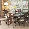 Elegant Modern Dining Table Set with Round Wooden Table Beige Upholstered Chairs and Floral Wallpaper