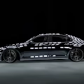 Sleek Black Sedan With Modern Sporty Design And Glossy Alloy Wheels
