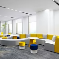Lounge Area with Yellow White Sofas Circular Seating and Large Windows Bright Interior