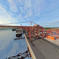 Busy Container Port With Cranes Containers Ships And Waterfront Dock