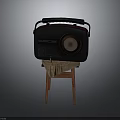 Vintage Retro Radio Electronic Appliance With Black Red Design On Wooden Stool