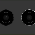 LUMIX Black And White Camera Lenses 25mm F1.7 ASPH Displayed On Reflective Surface