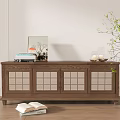 Modern Wooden TV Stand with Glass Panel Doors and Decorative Painting Near Books and Potted Plant