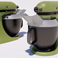 Green Kitchen Stand Mixers With Two Black Mixing Bowls And White Attachments