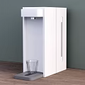 White Household Water Dispenser with Transparent Glass on Tray Against Green Wall and Wooden Floor