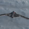 Camouflage Stealth Fighter Jet Flying Through Cloudy Sky With Flying Wing Design