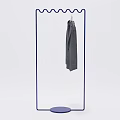 Modern Metal Clothing Rack With Wavy Top Circular Base And Gray Garment Hanging