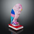 Decorative Owl Figurine With Pink Blue Woven Body Standing On A Red Hardcover Book