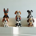 Six Different Dog Stuffed Toys Displayed On White Shelf With Soft Lighting