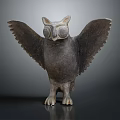 Owl Sculpture With Spread Wings Large Round Eyes And Standing Posture Displayed On Dark Background
