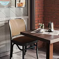 Wooden Dining Table Set With Rattan Chair Kettle Small Flowers And Brick Wall